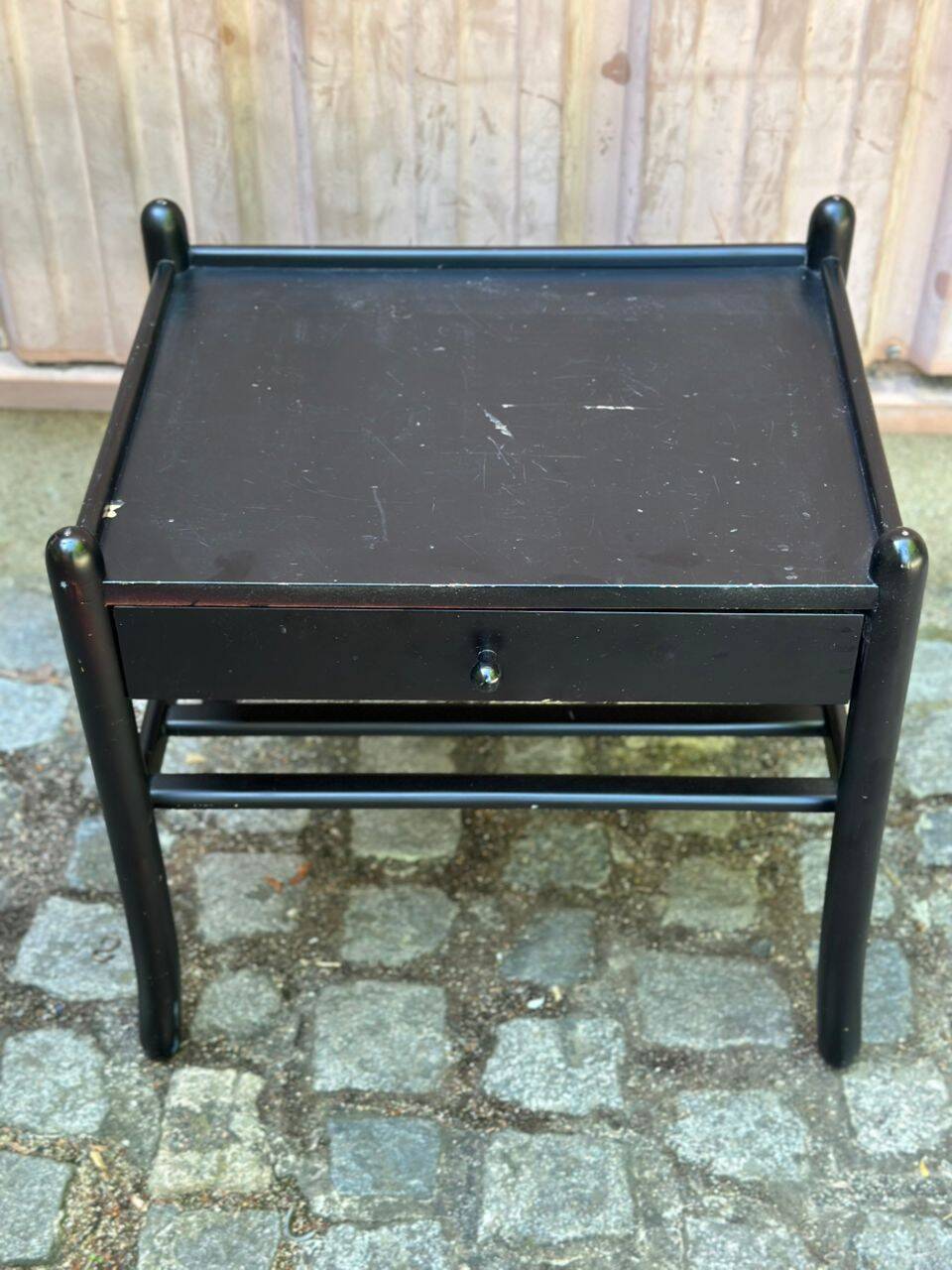 Vintage bedside table from the 1980s in black wood.