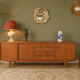 Scandinavian teak sideboard, 230 cm long, with 3 doors and 4 drawers.