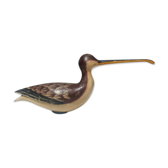 Carved painted wooden curlew