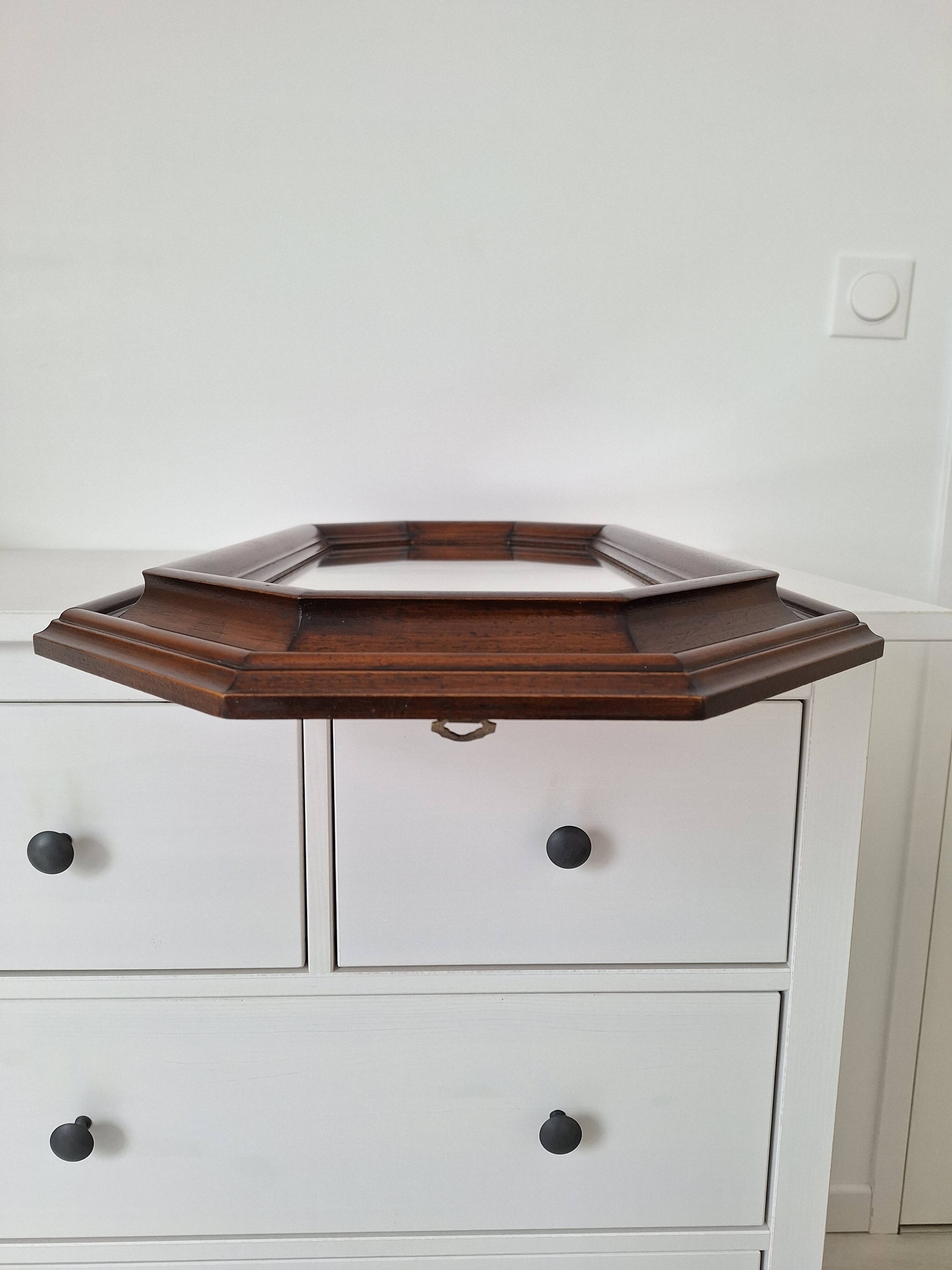 Octagonal wooden mirror from the 1980s.