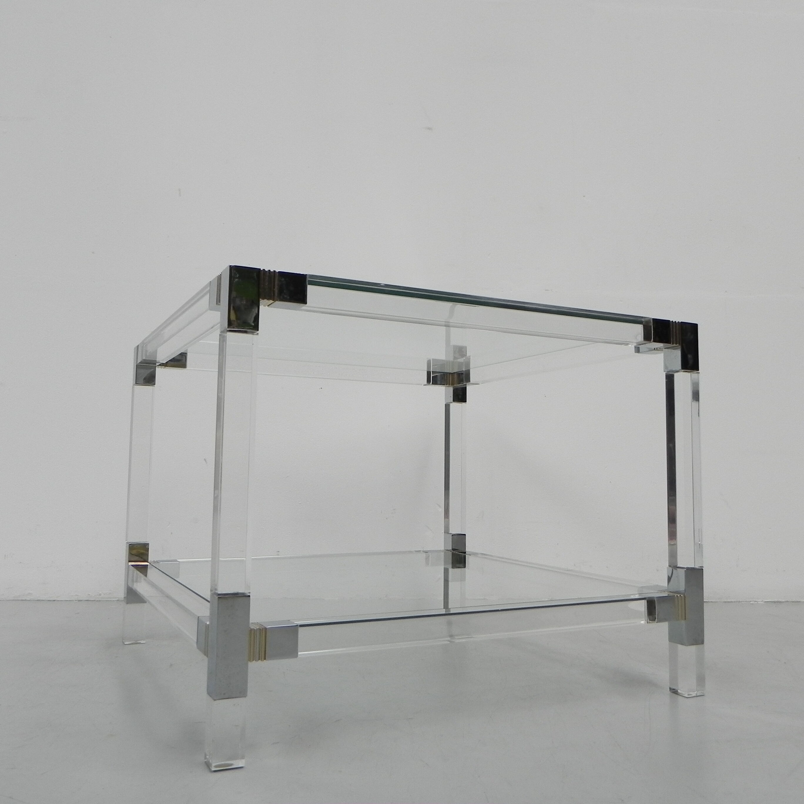Hollywood Regency coffee table with perspex frame