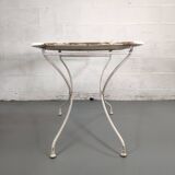 Ancienne table de jardin pliante en fer forgé blanche