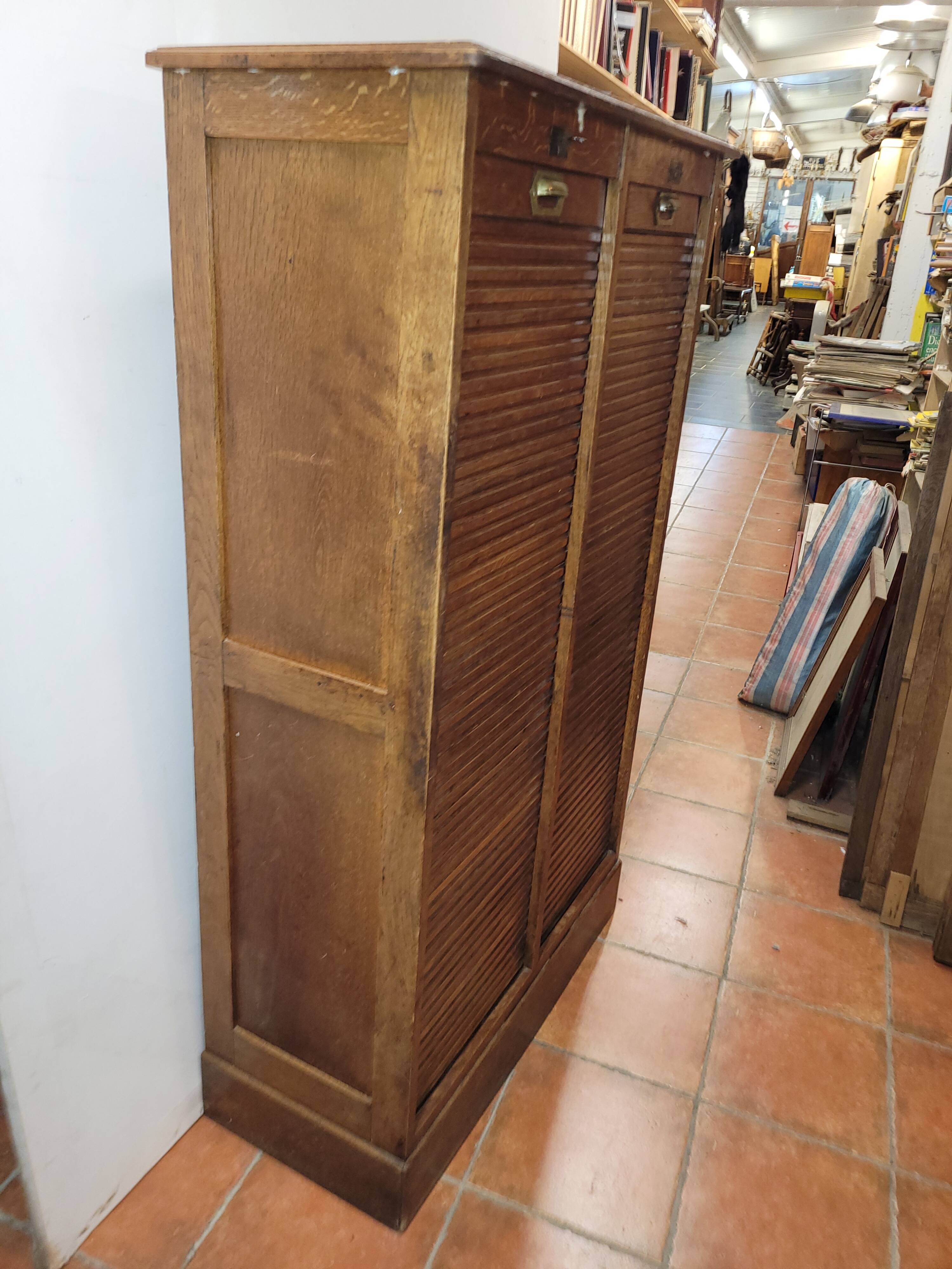 Old double curtained oak filing cabinet