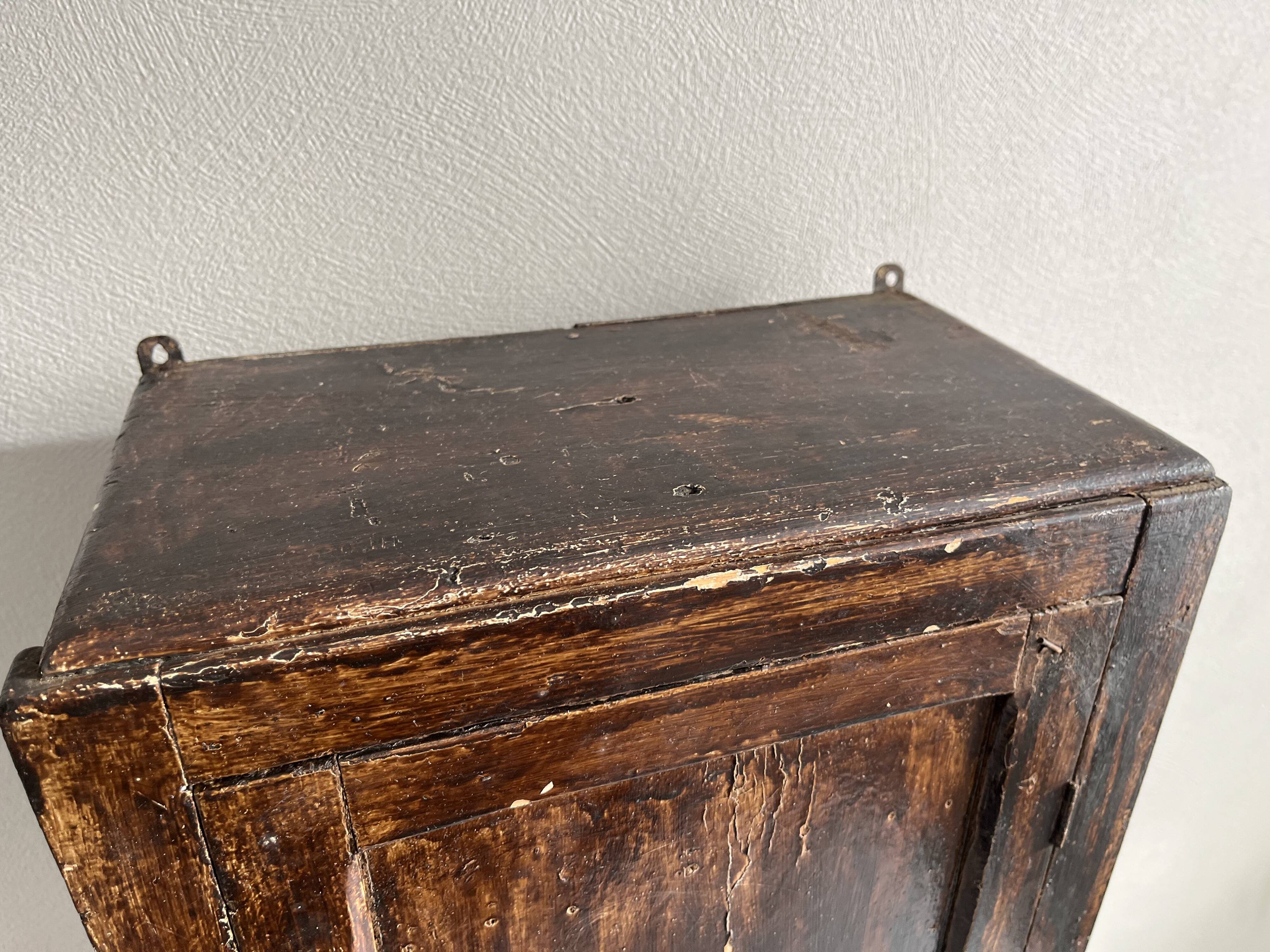 Patinated wooden toilet cabinet / pharmacy