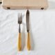 Case with cutlery for serving or cutting meat in baquelite