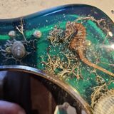 Mirror on resin support with inclusion