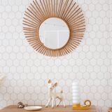 Old large rattan sun mirror