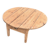 Round coffee table with 1 drawer, antique, made of raw solid wood.