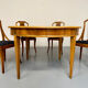 Round walnut Napoleon III extendable table with bronze top in good condition.