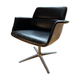 Swivel leather armchair