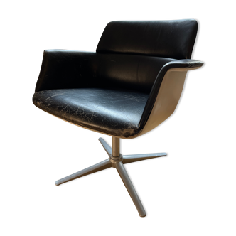 Swivel leather armchair