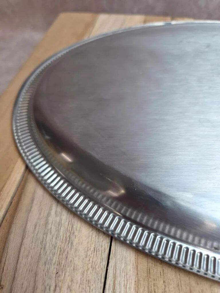 Vintage silver-plated metal tray with a segmented glass aperitif dish.