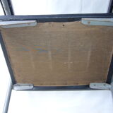 Old industrial chair in skai and metal