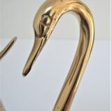 Pair of stylized birds in solid brass