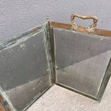 Antique fireplace screen in copper and brass from the 19th century.