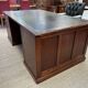 Large English flat desk in mahogany with leather top, early 20th century