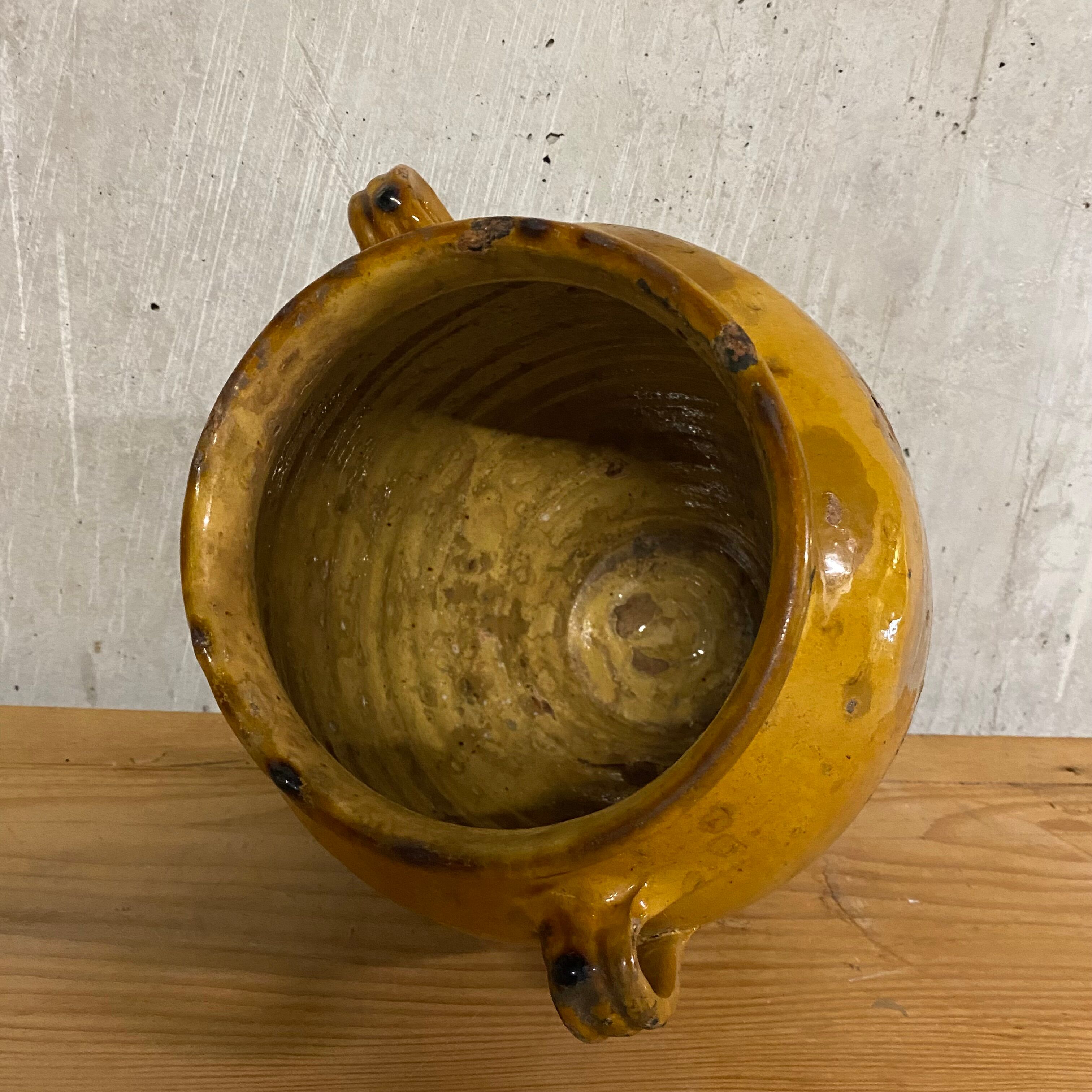 Yellow grease pot