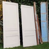 Pair of cupboard doors and old woodwork frame