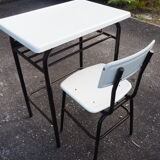Schoolboy style desk with its white adult size chair