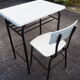 Schoolboy style desk with its white adult size chair