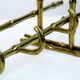 Bamboo-like coat rack in bronze