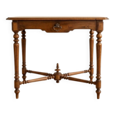 Antique walnut desk with a drawer and turned legs.