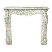 Green marble fireplace in Louis XV style
