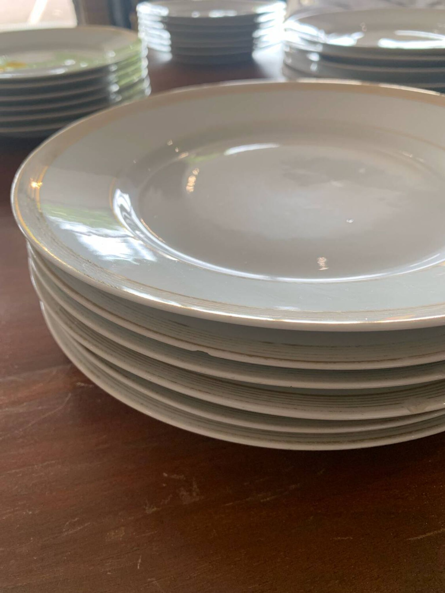 Lot of six flat plates, crockery, old white, gilded