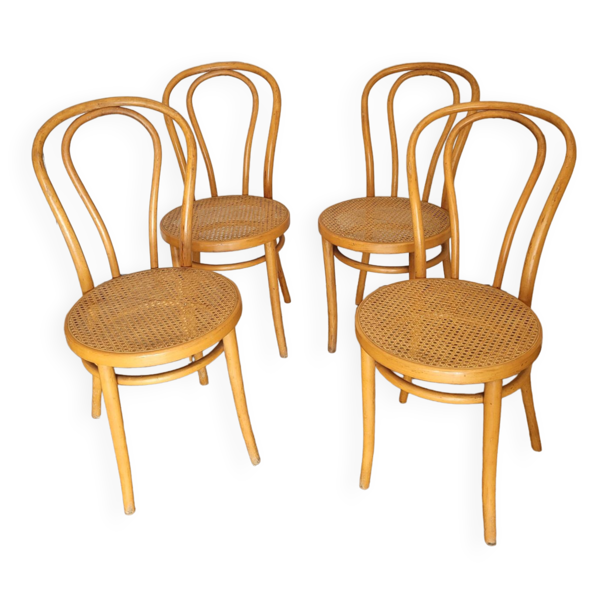 Four cane bistro chairs