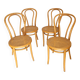 Four cane bistro chairs