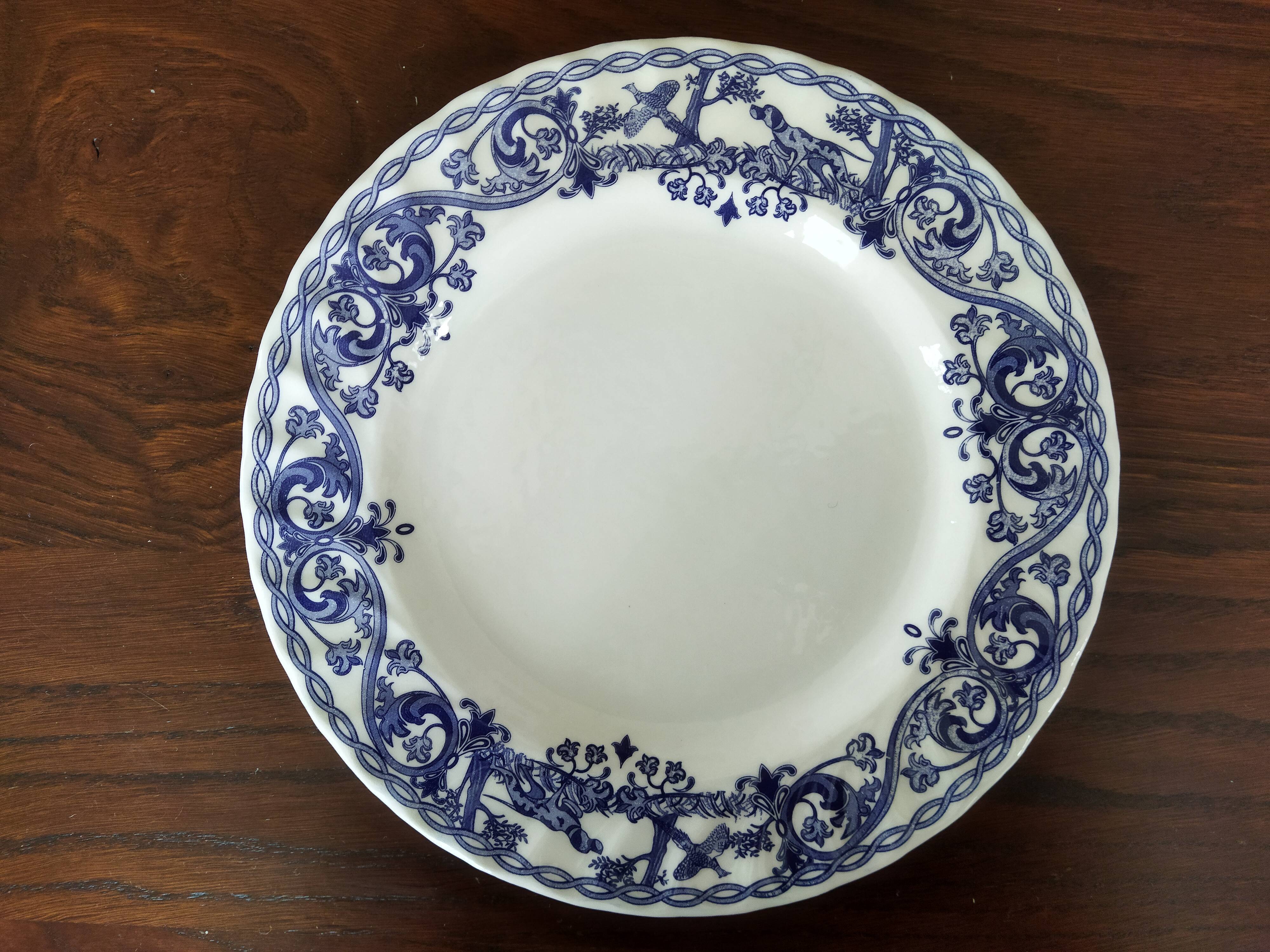 8 blue & white plates