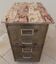 Old industrial furniture in rusty effect metal with two drawers on casters