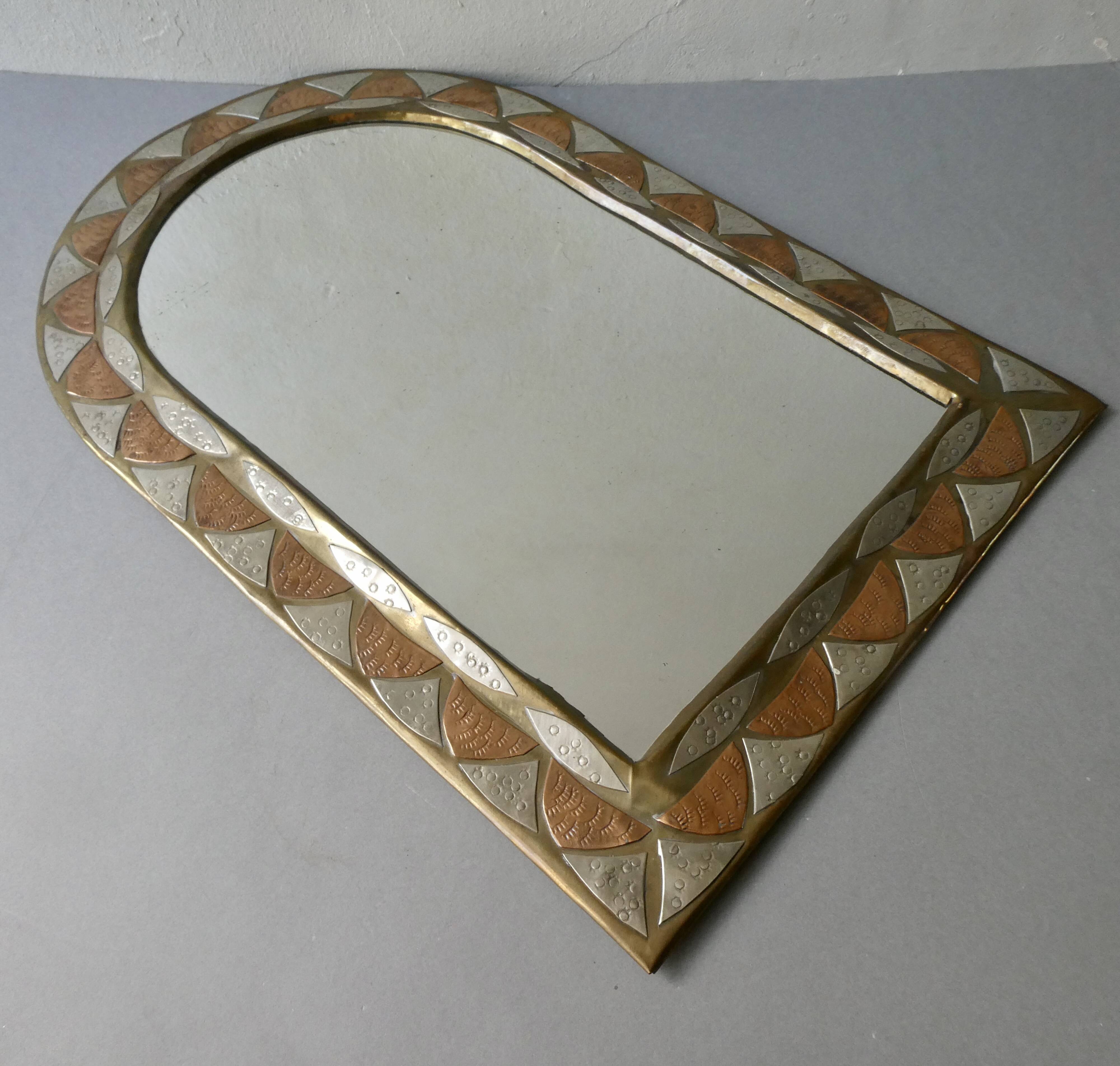Moroccan mirror in chiseled brass, copper and silver, 70s-80s