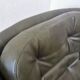 Dark green vintage leather armchair: 1970s Scandinavian style