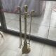 Brass fireplace tool set