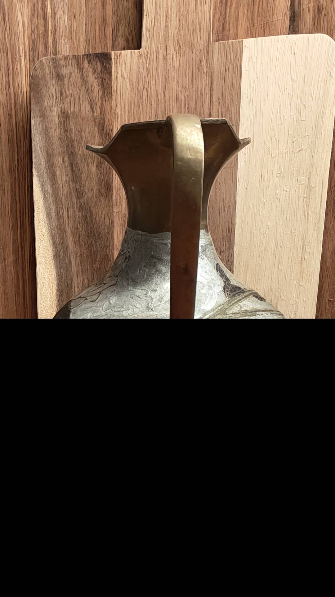 I am selling this very pretty jug/decorative vase in an artisanal style.