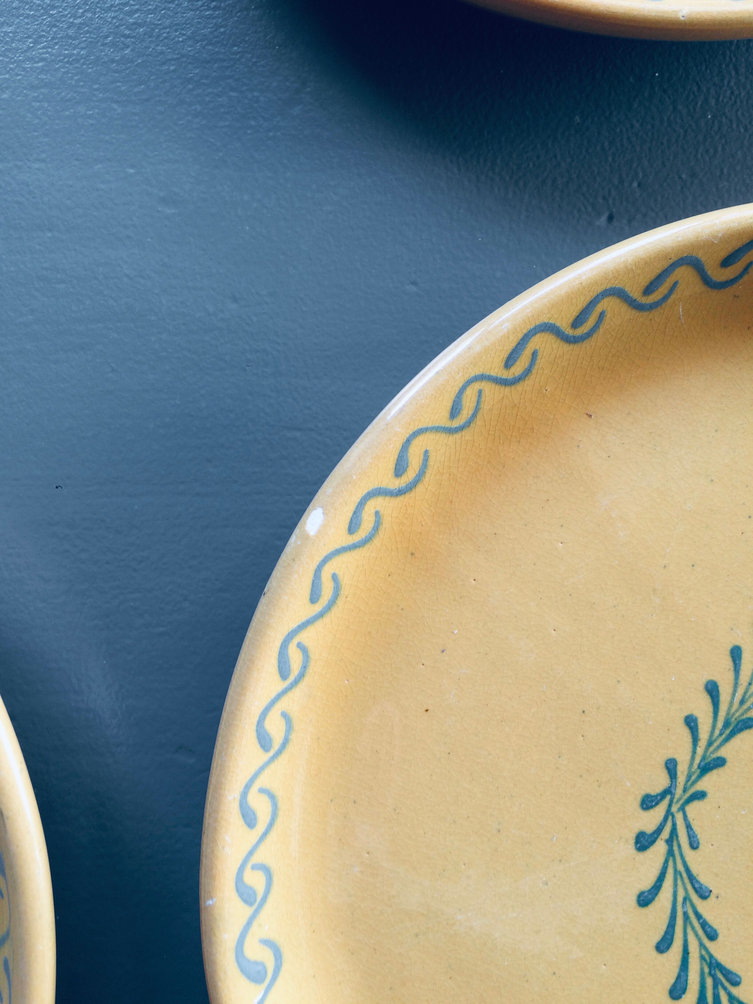 The six Piaf plates in painted terracotta