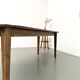 Farm table in walnut with spindle legs.