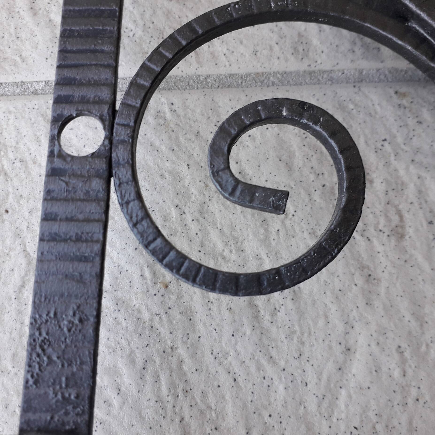 Wrought iron coat rack