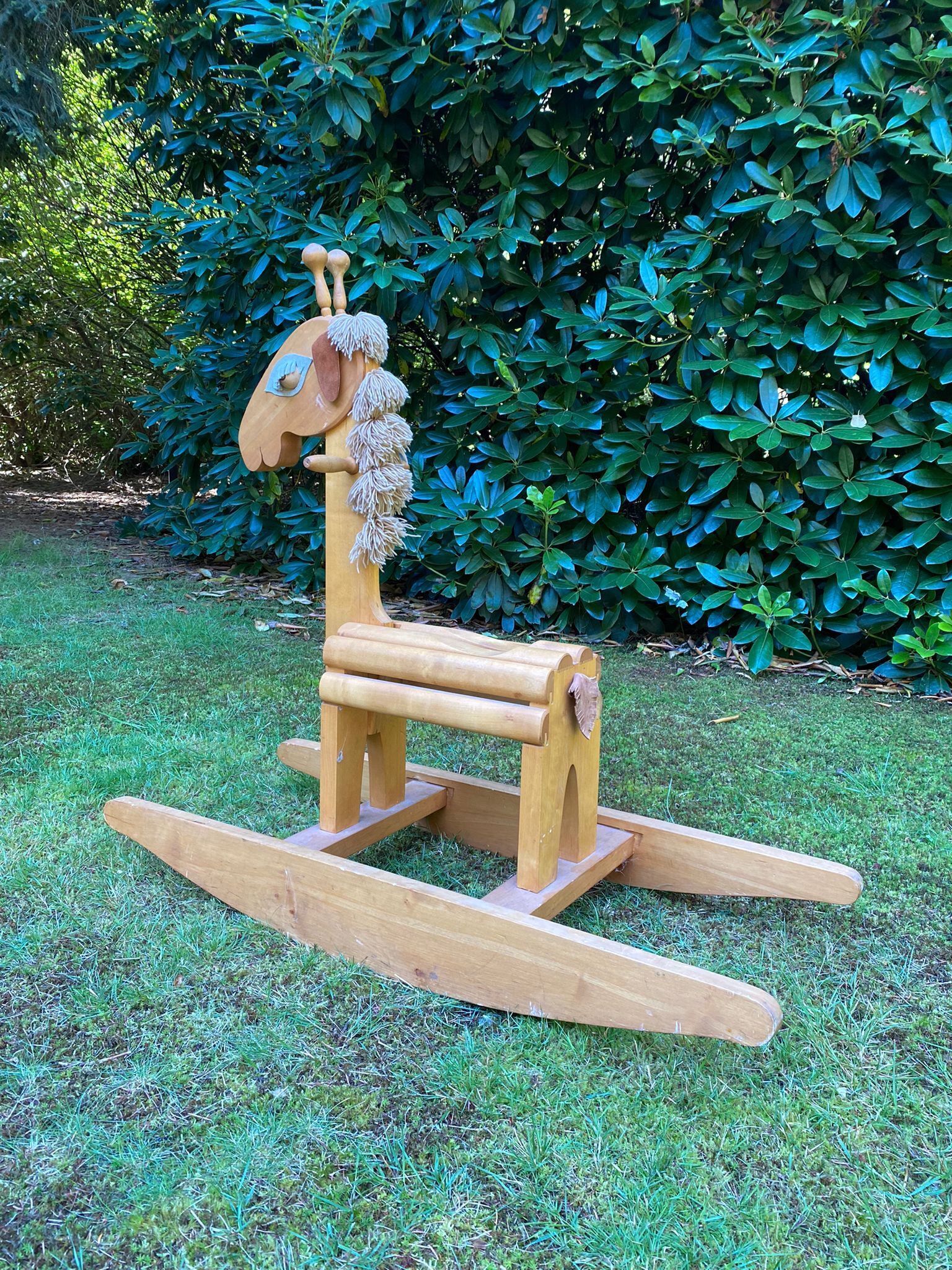 Vintage leather and pinewood rocking horse, giraffe, ca. 1970s