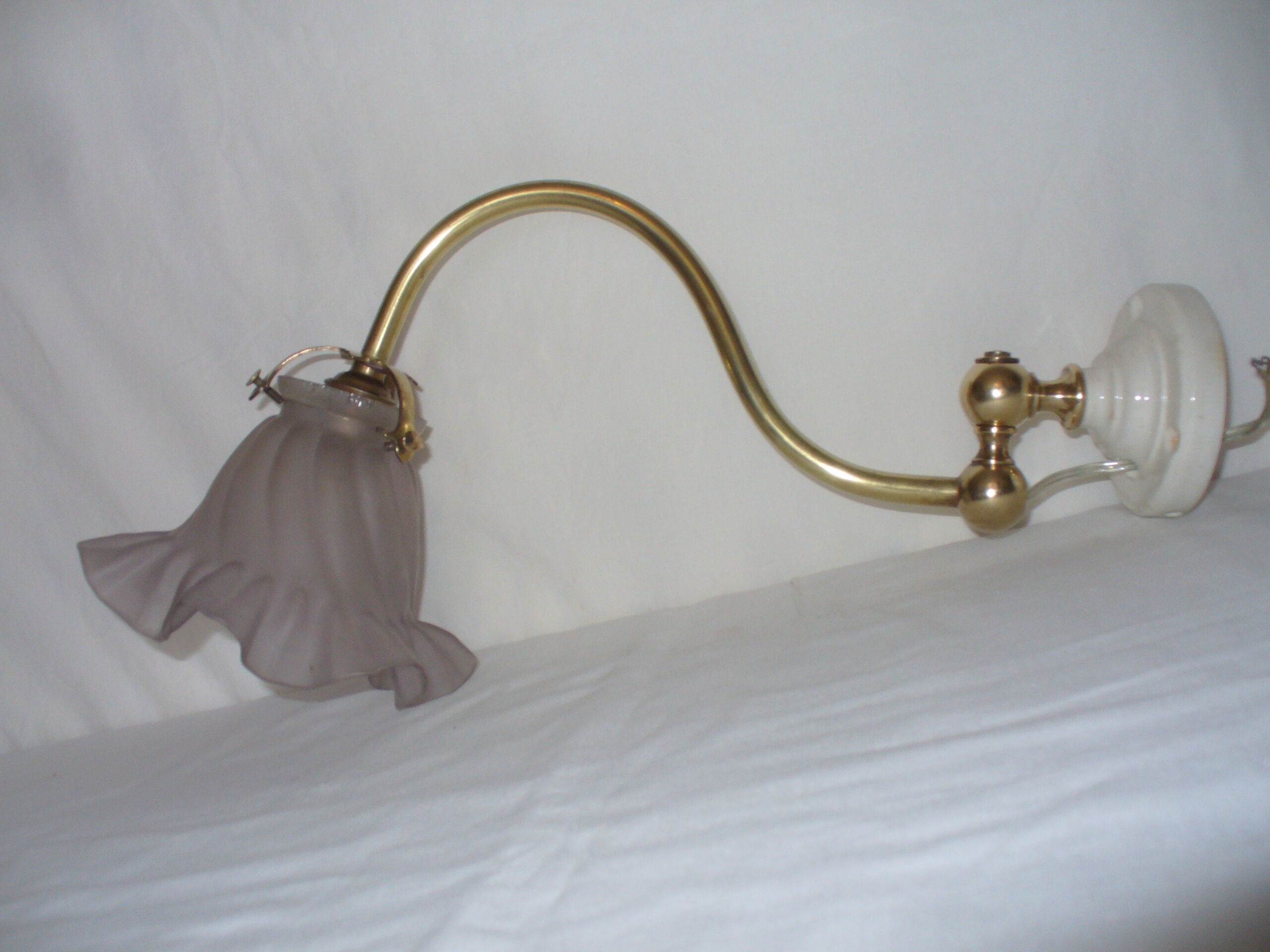 Applied articulated swan neck of the 1930s