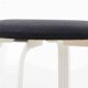 Alvar Aalto 64 stool upholstered in black and white for Artek.