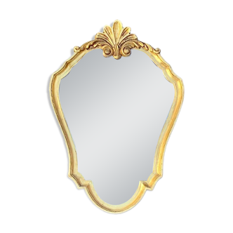 Vintage wall mirror with golden resin shell