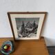 Framed old photo of a mountain landscape.