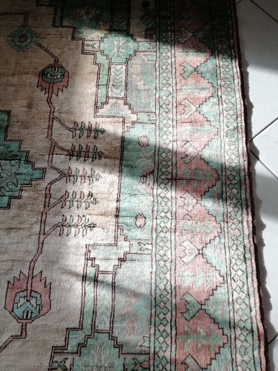 Afghan rug in pastel colors