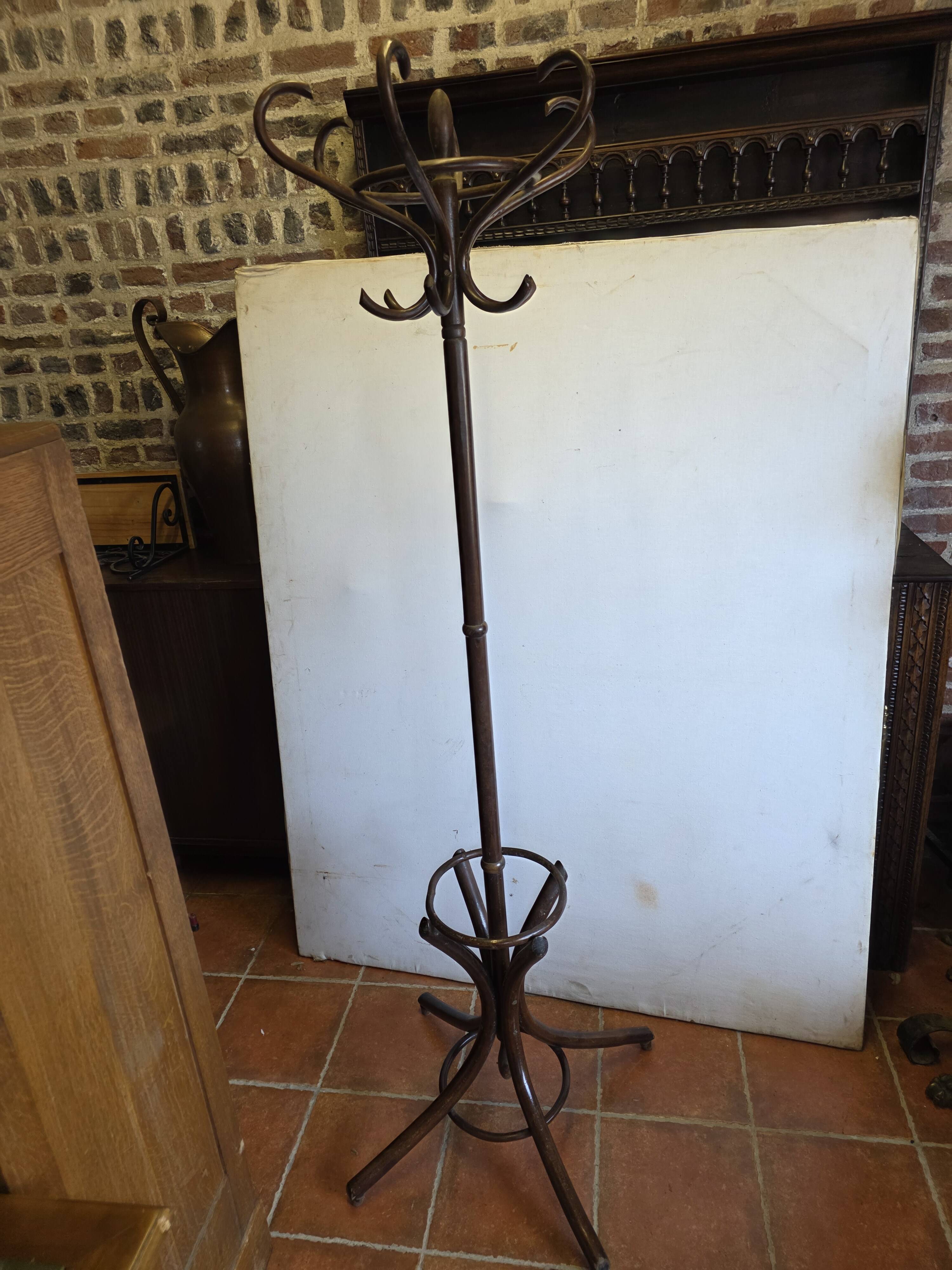 Curved antique wooden parrot
