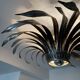 Silver wrought iron sunburst wall light from the 1960s.