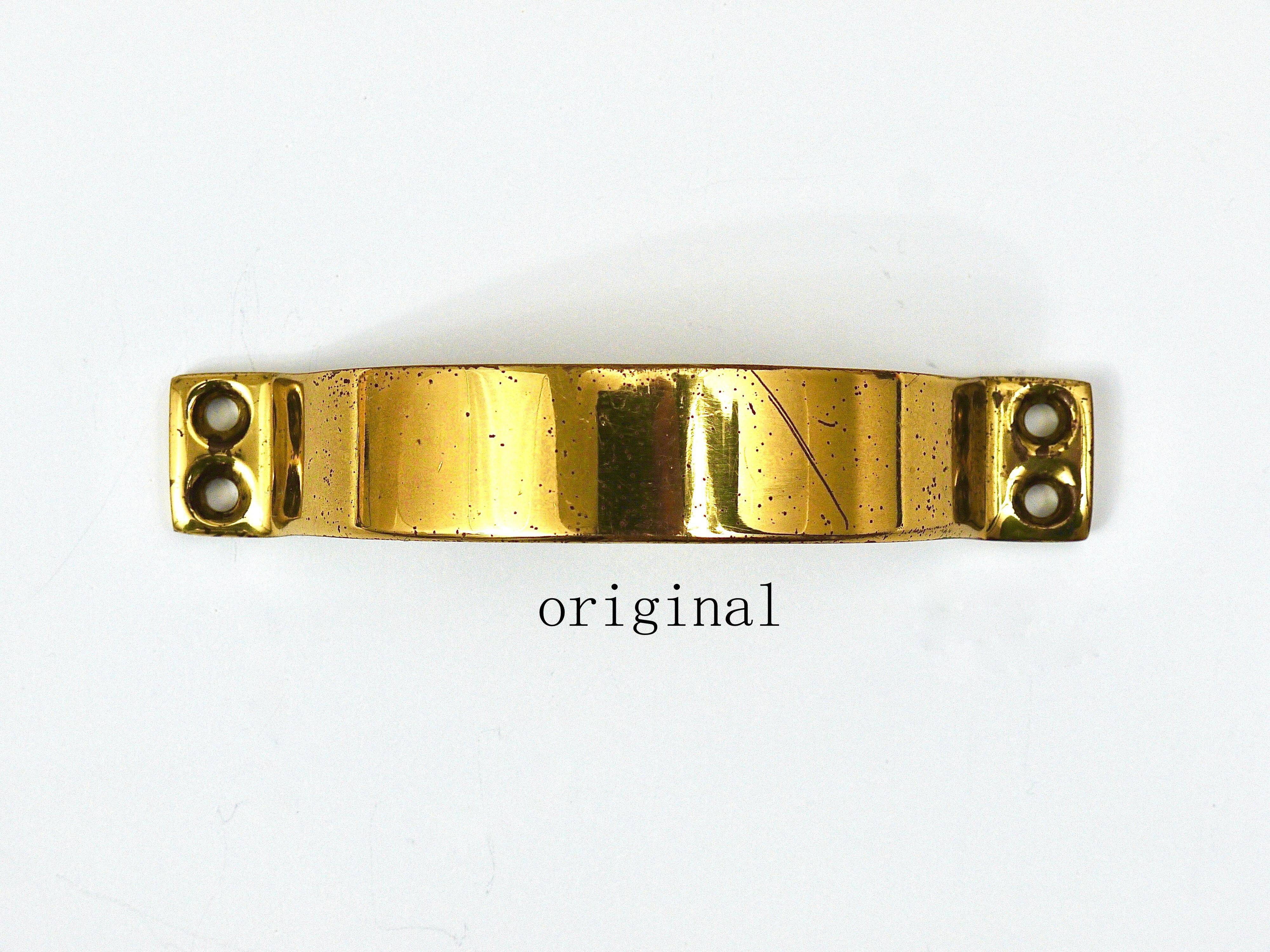 Up to 50 mid-century brass handles for doors, drawers, chests of drawers, Austria, 1950s.