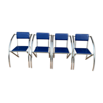 Quartet of blue chairs with design curves