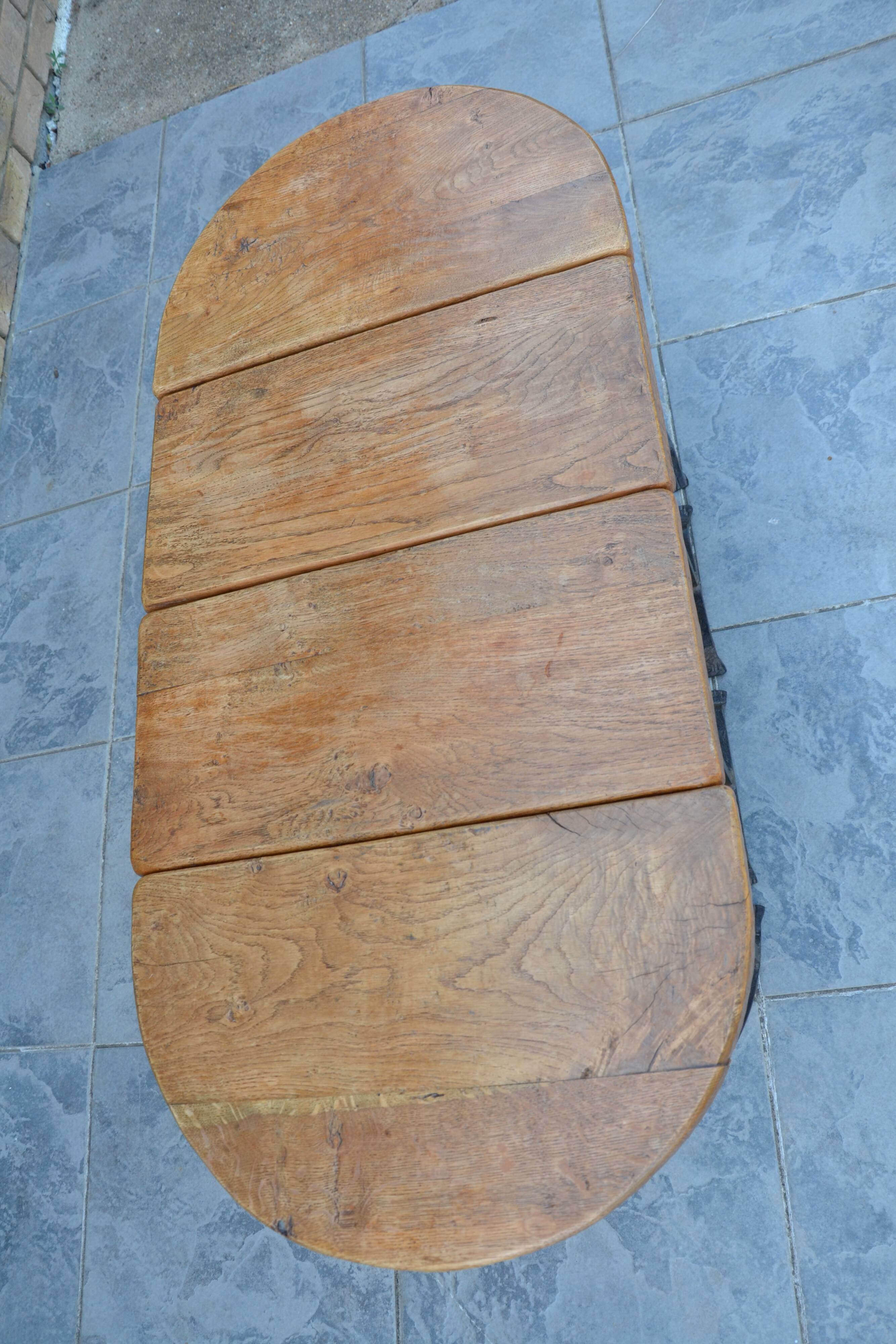 Unusual modular coffee table in oak and wrought iron.